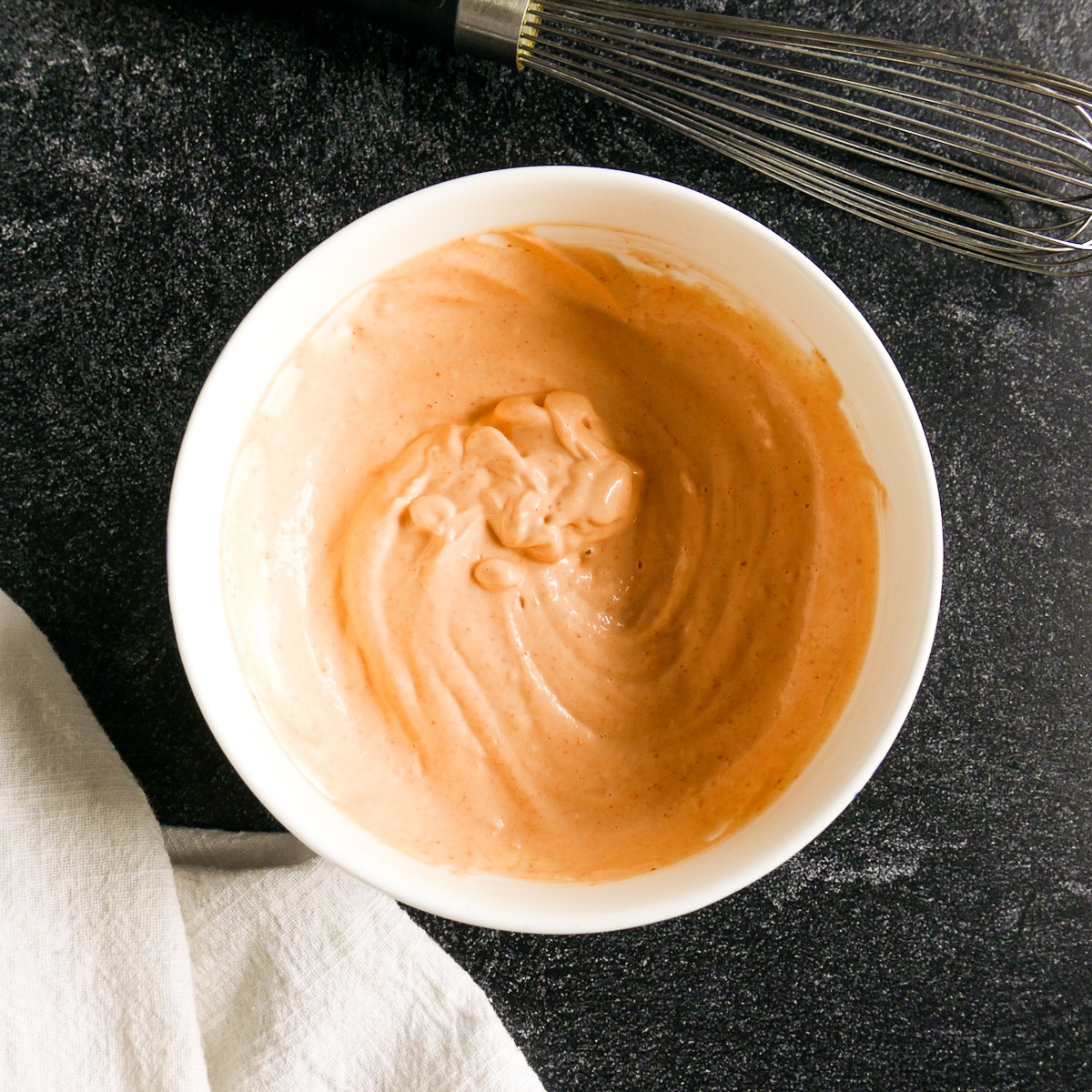 spicy aioli mixed together in a bowl.