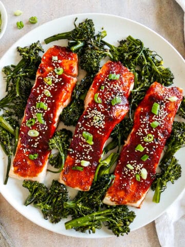 platter of gochujang salmon with roasted broccoli.