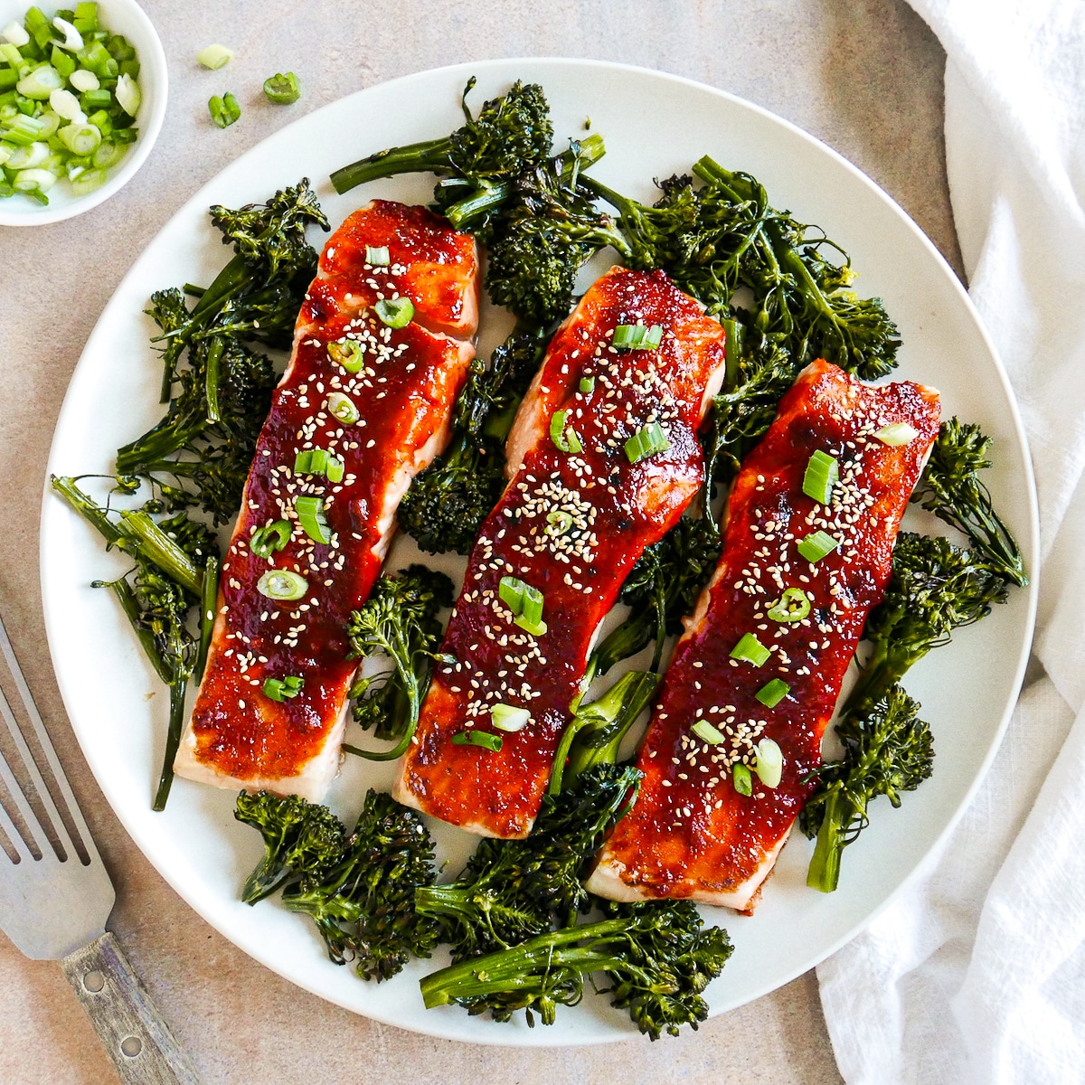 platter of gochujang salmon with roasted broccoli.