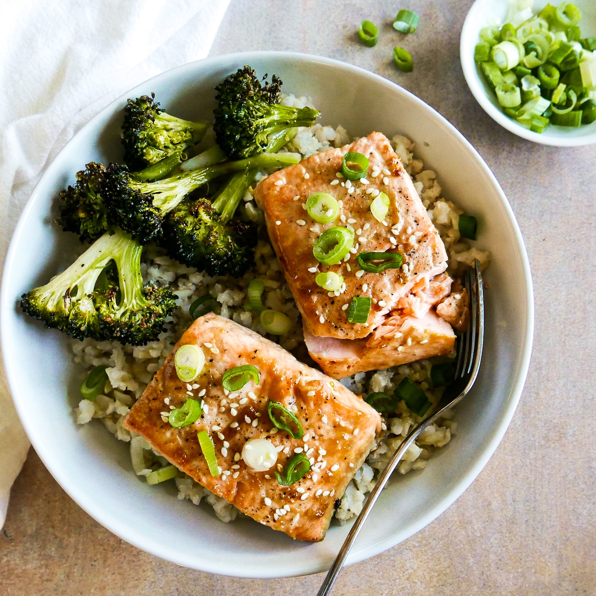 salmon with miso, broccoli, and rice in a bowl.