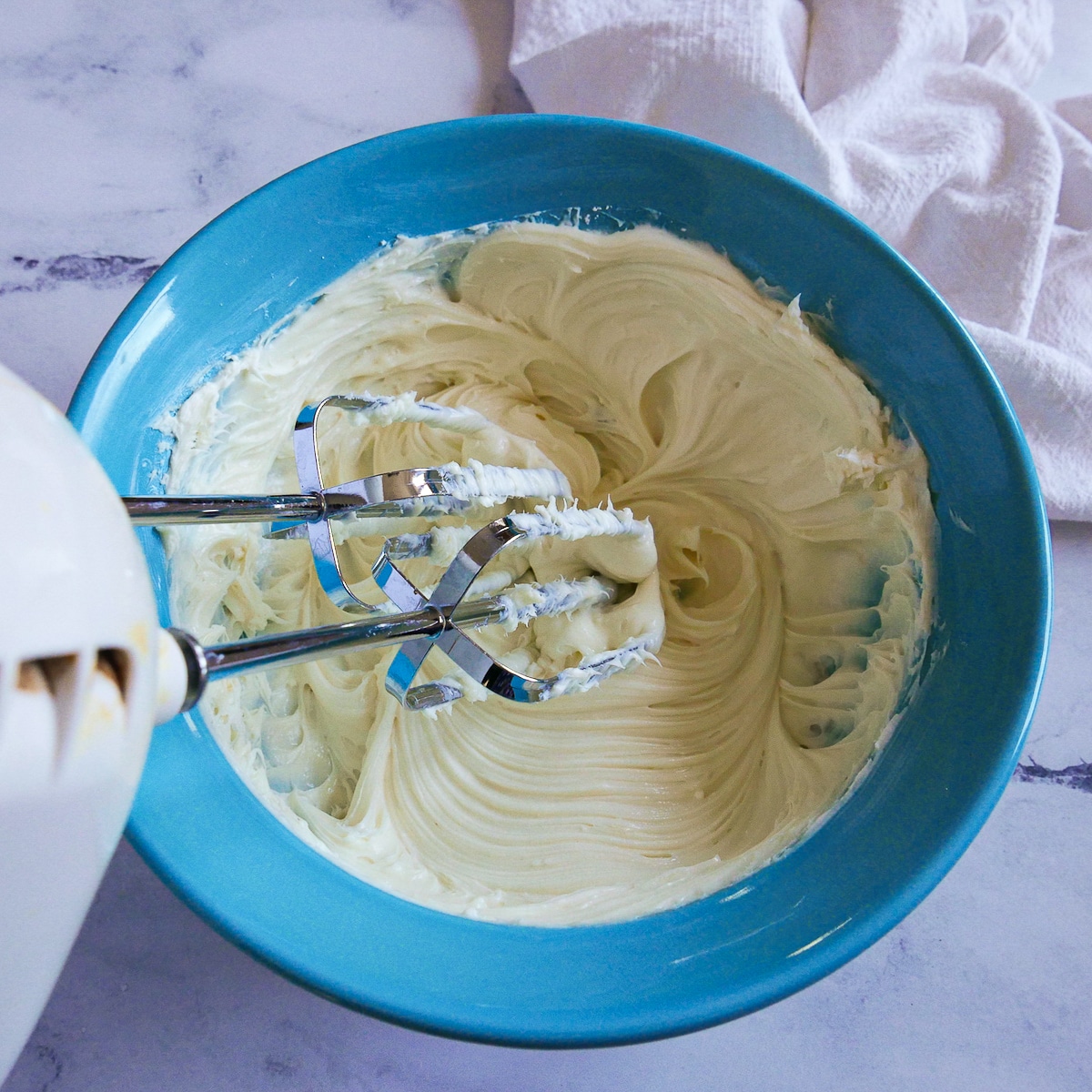 cream-cheese-mixture.jpg Beating the cream cheese, powdered, sugar, and vanilla.