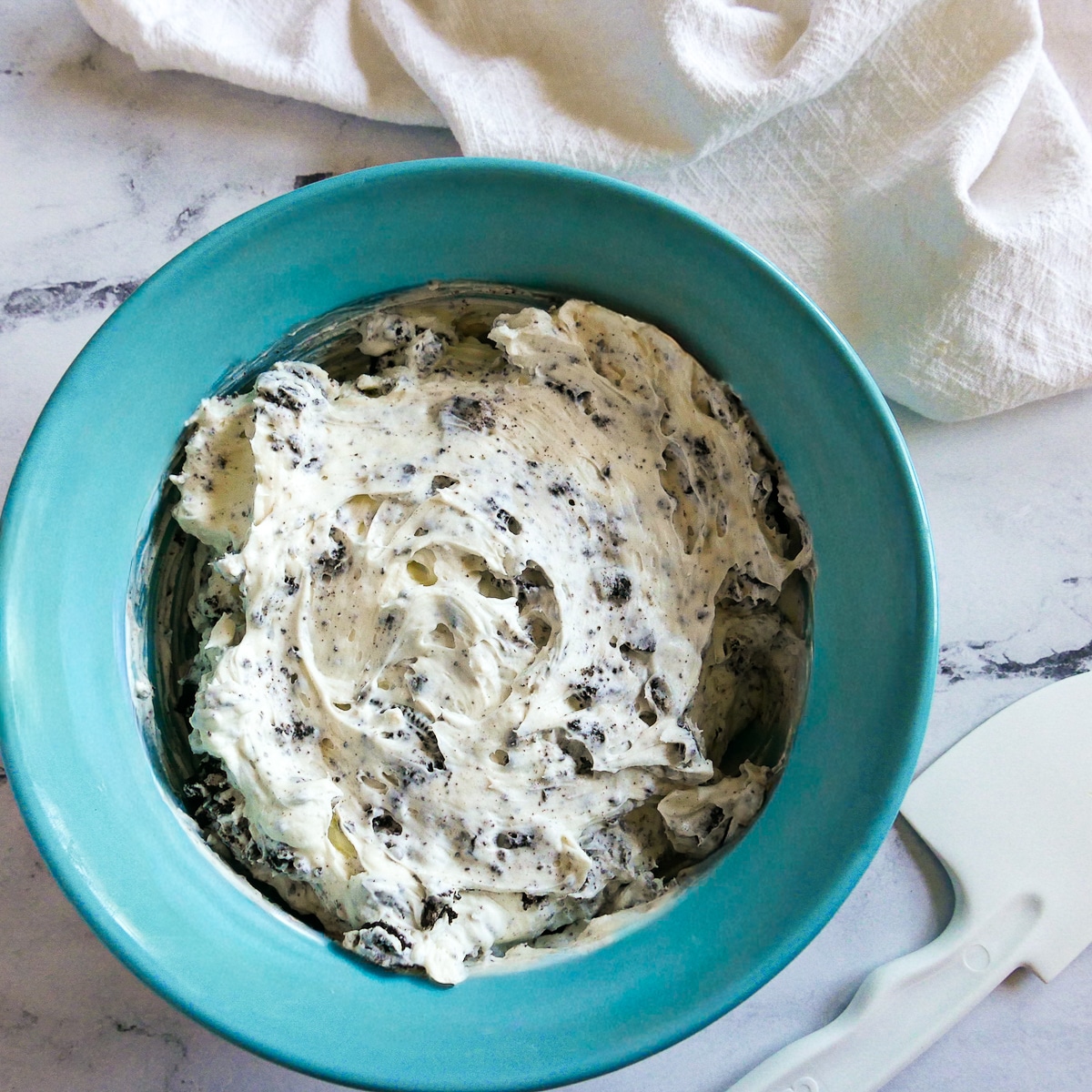 oreo-dip.jpg Creamy oreo dip served in a bowl.