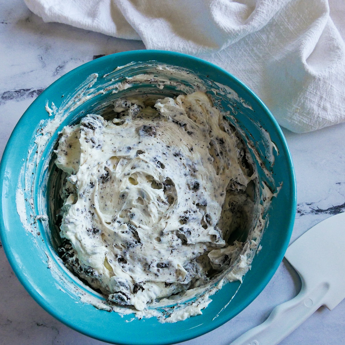 whipped cream and crushed oreos folded into cream cheese mixture.