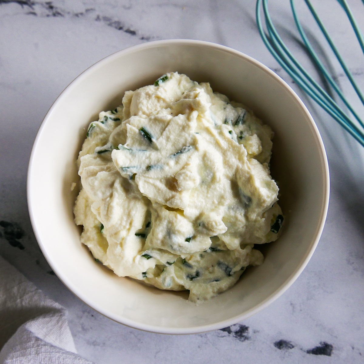 ricotta, garlic, chives, salt, and pepper whisked together.