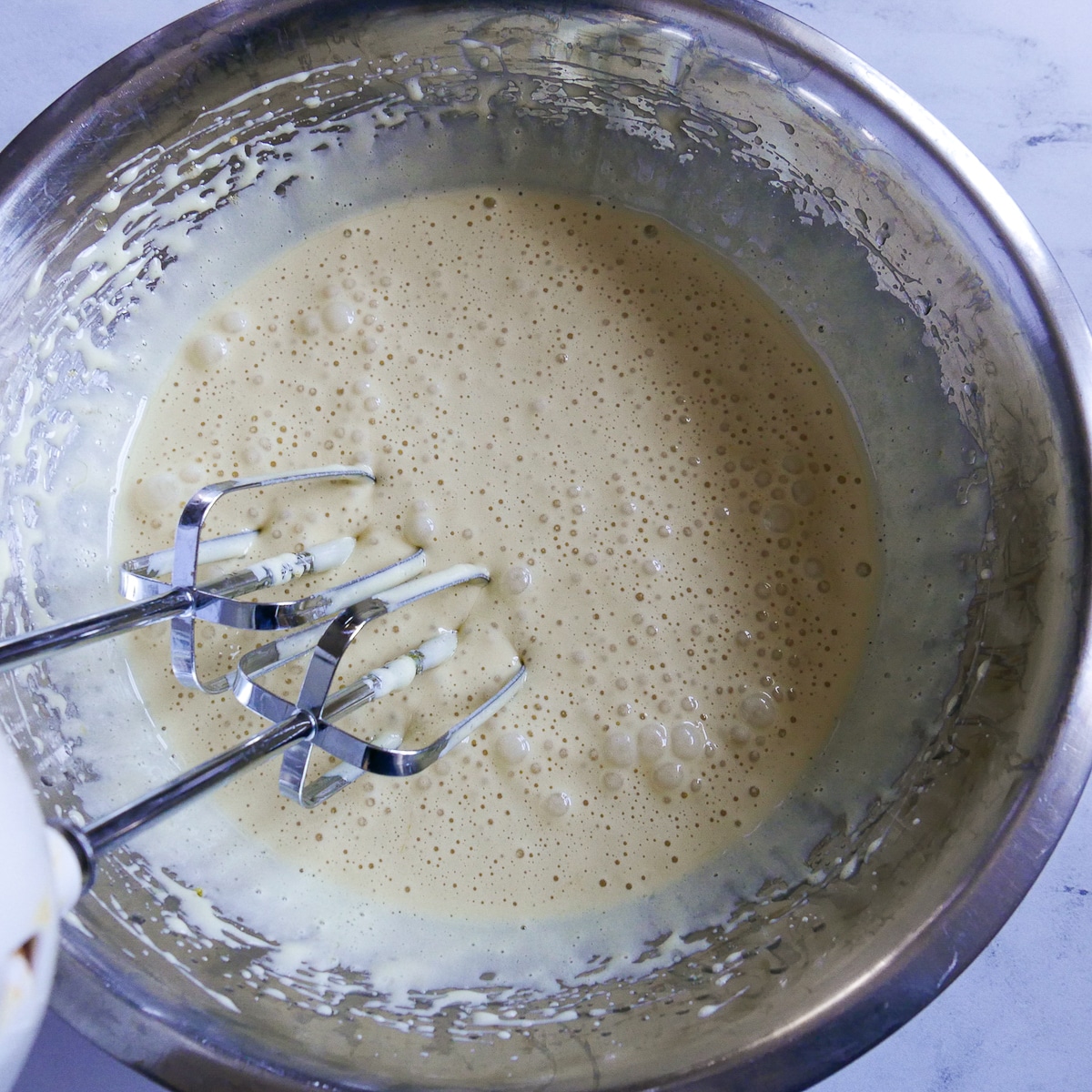 oil and vanilla extract added to sugar & egg mixture.
