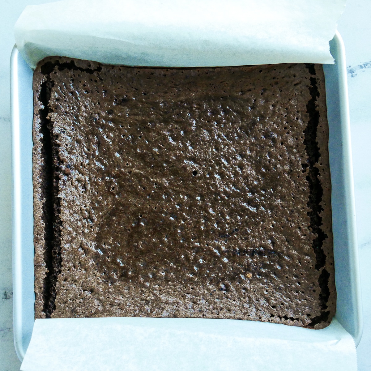 baked brownies in a square pan.