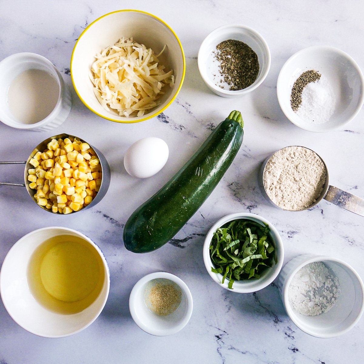 Fritter ingredients arranged on a table.