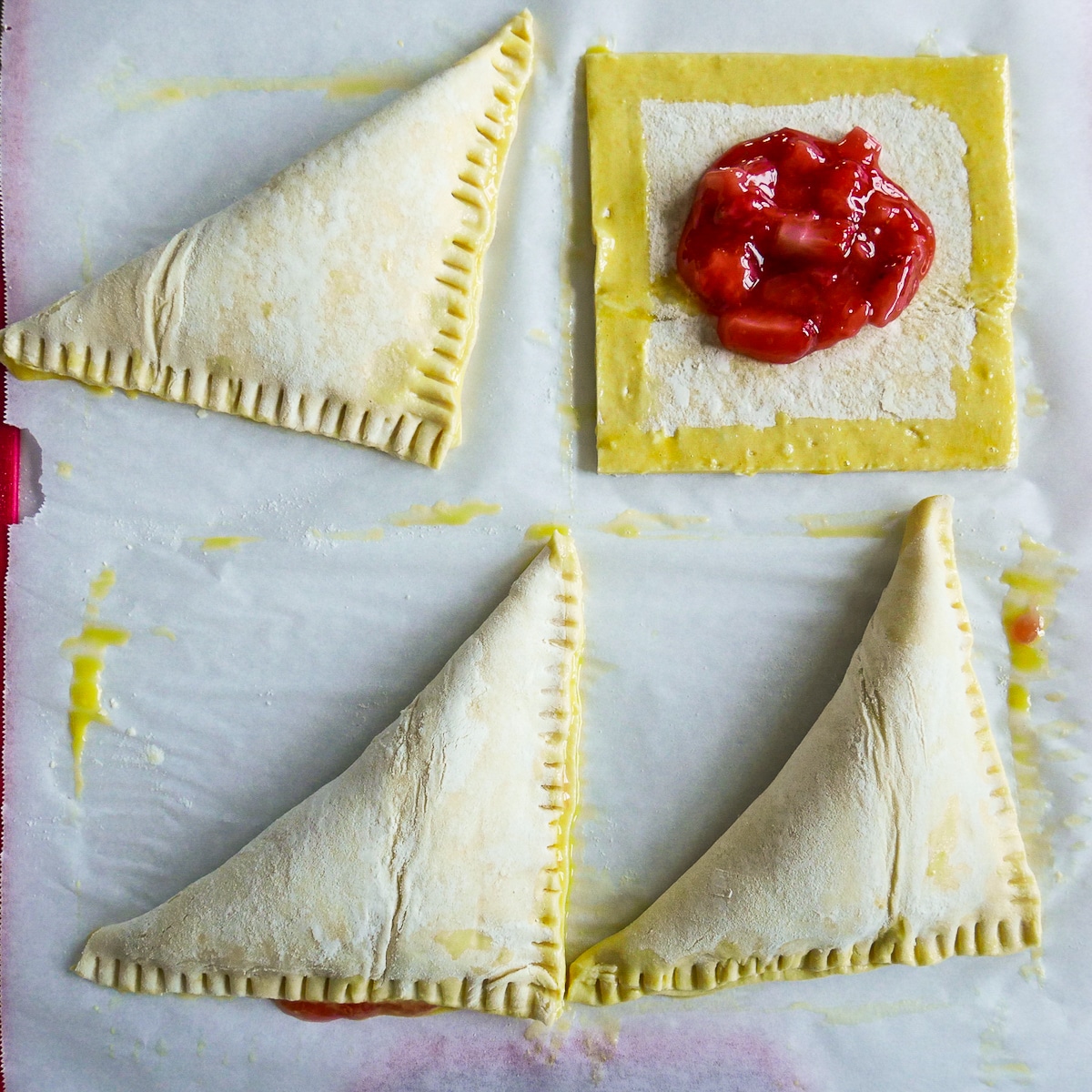 folded-pastry.jpg Pastry folded into triangles and crimped with a fork.