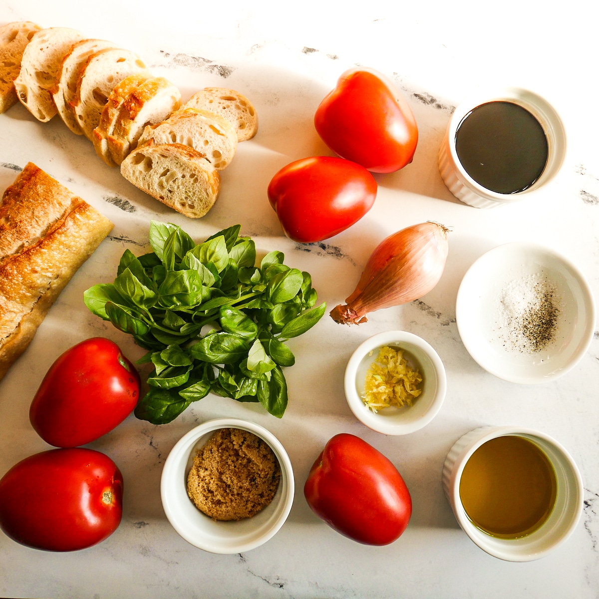 bruschetta ingredients arranged on a table.