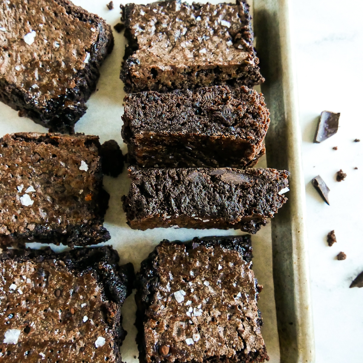 No butter brownies arranged on a baking tray.