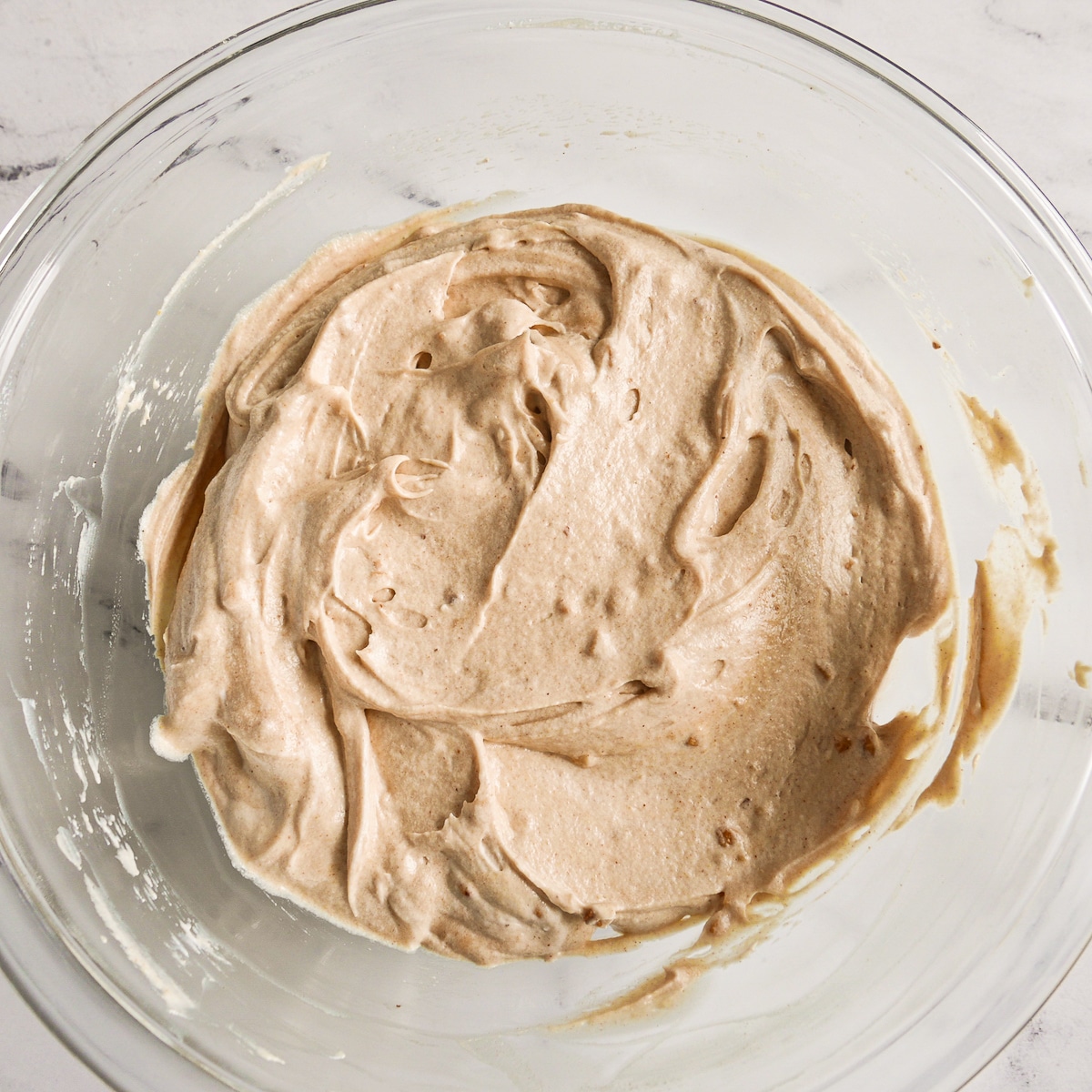 Coconut whipped cream folded into peanut butter mixture.