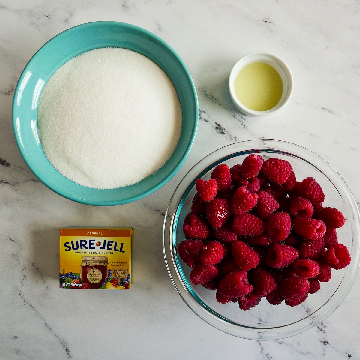 Jam ingredients arranged on a table.