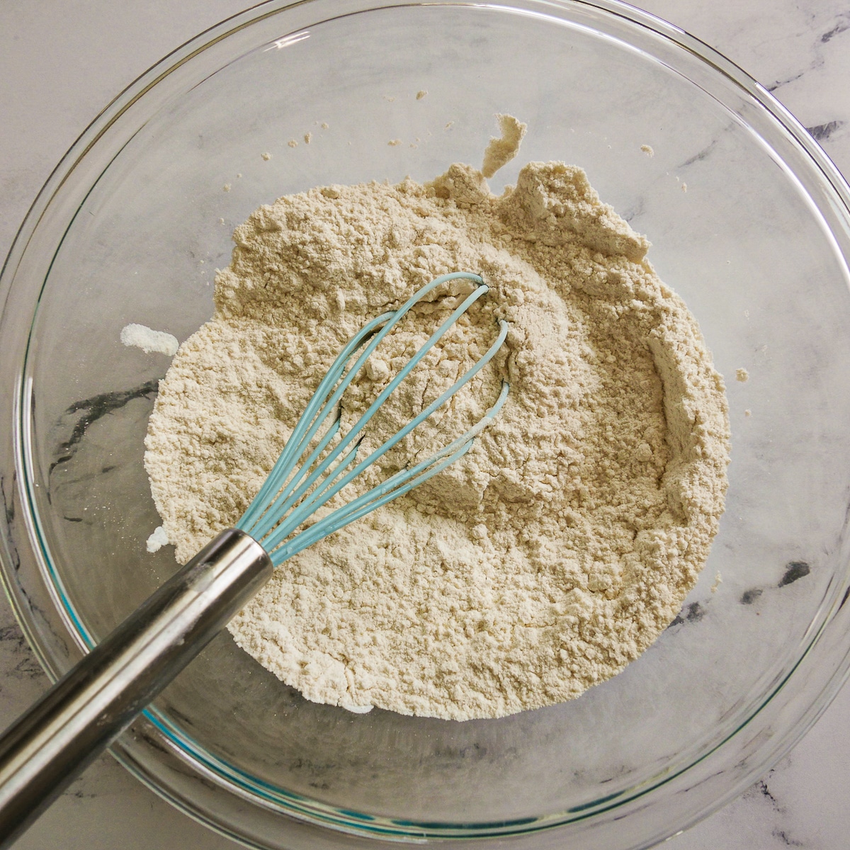 dry-ingredients.jpg Dry ingredients whisked together in a mixing bowl.