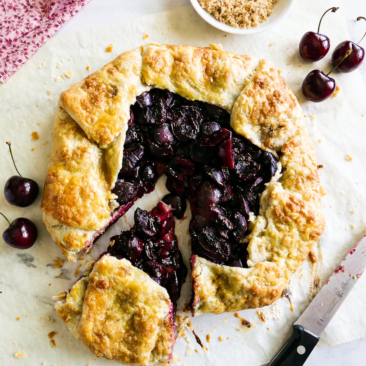 cut-galette.jpg Galette with one piece cut and a knife resting nearby.