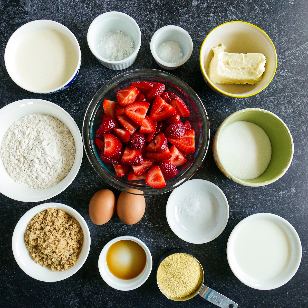 cake-ingredients.jpg Cake ingredients arranged on a table.