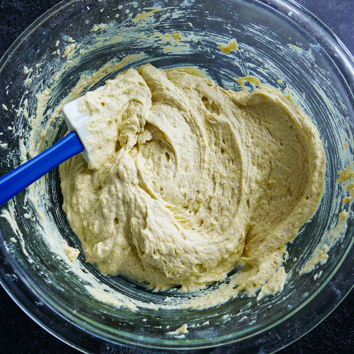 cake-batter-in-bowl.jpg Dry and wet ingredients mixed into cake batter.