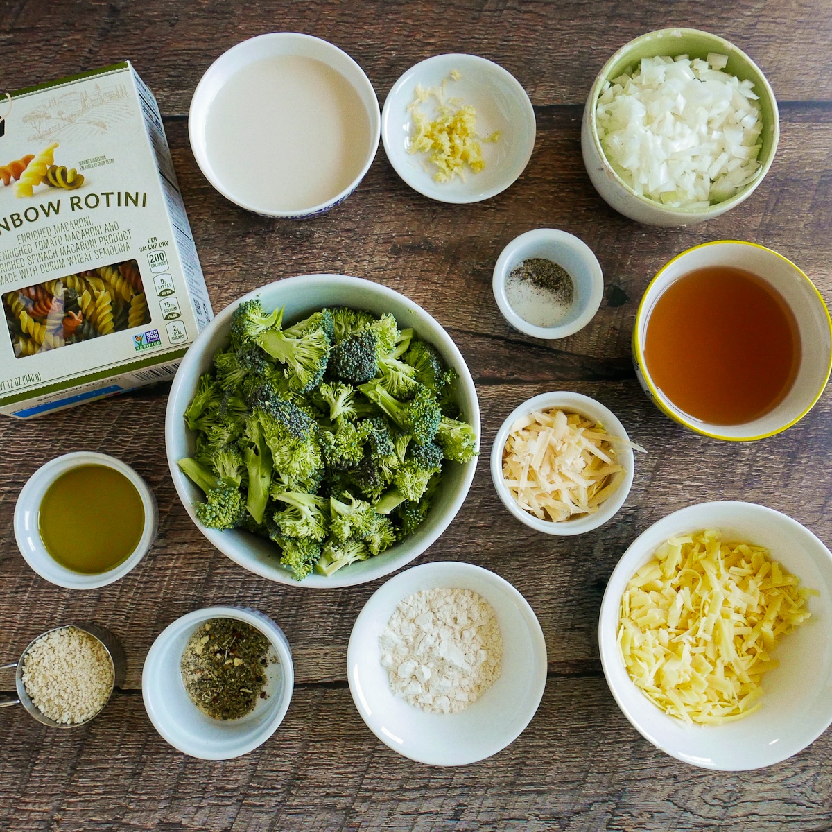 Pasta bake ingredients arranged on a table.