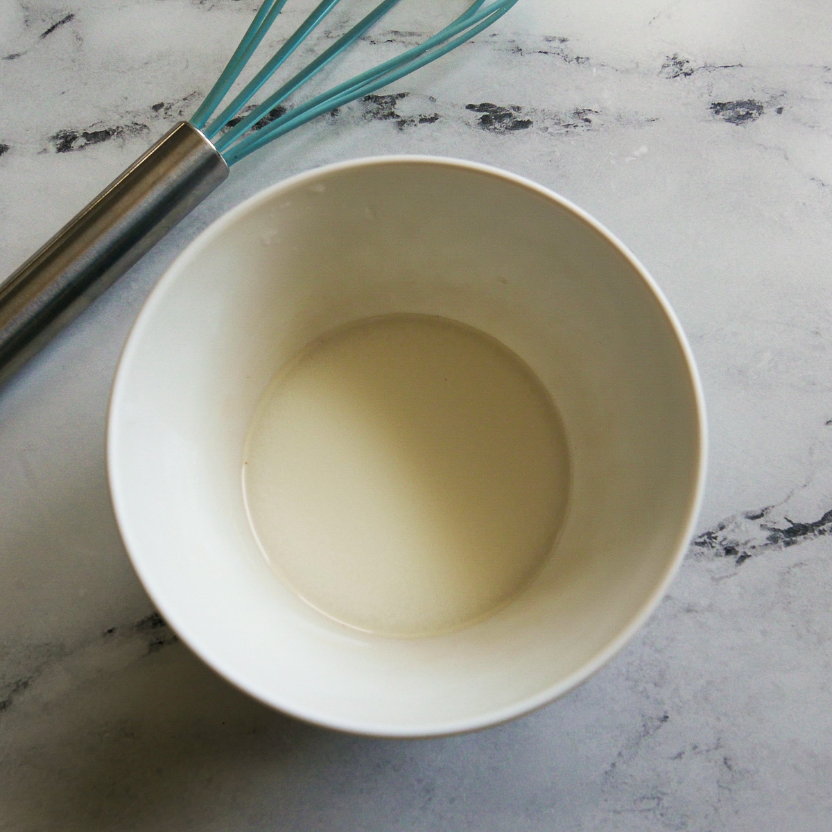 Cornstarch slurry in a small bowl.