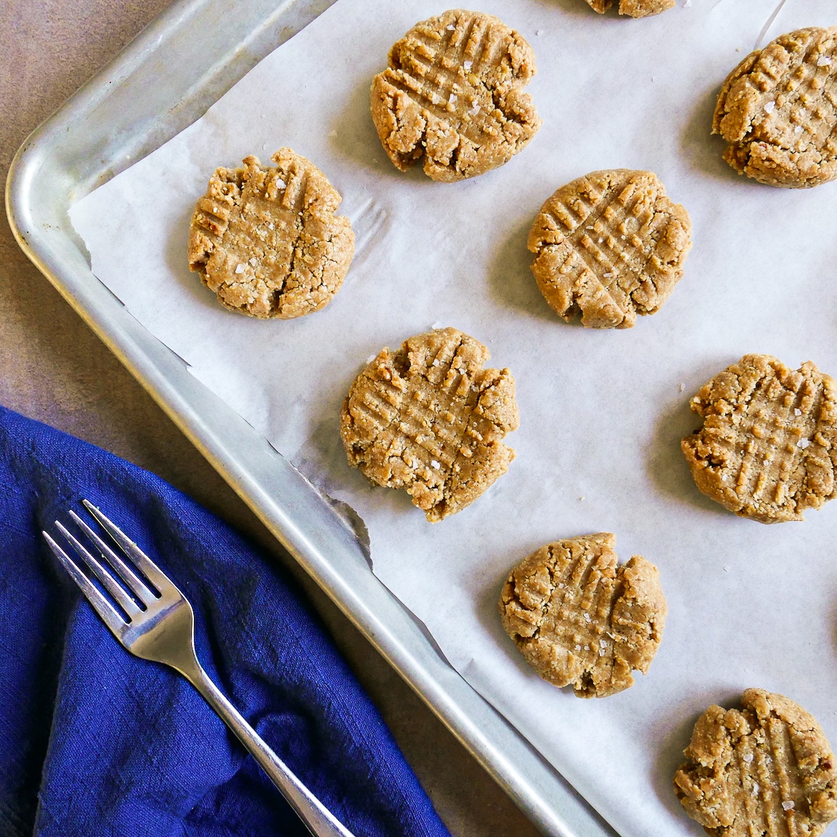 cookies pressed into a criss-cross pattern with fork.