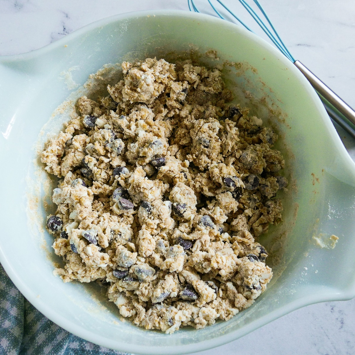 scone-dough-in-bowl.jpg wet ingredients mixed into dry ingredients in a bowl.