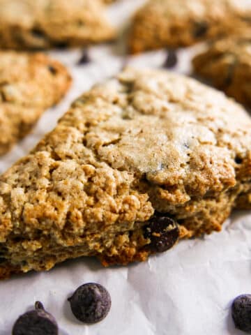 sourdough discard scones arranged on a parchment-lined baking sheet.