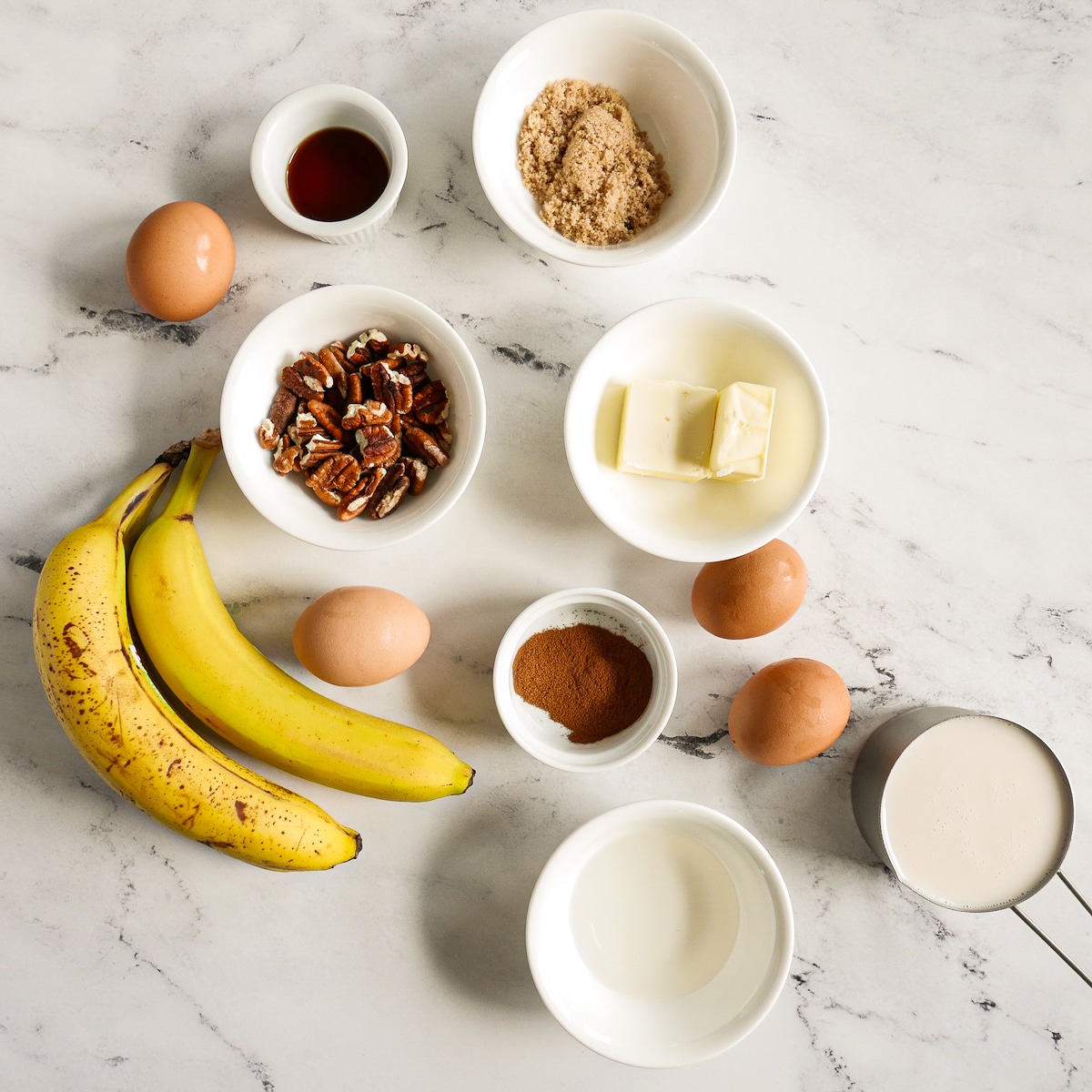 French toast ingredients arranged on a table.