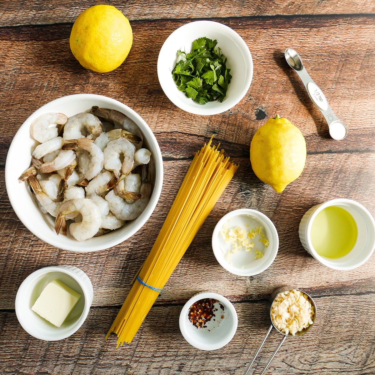 Recipe ingredients arranged on a wooden table.