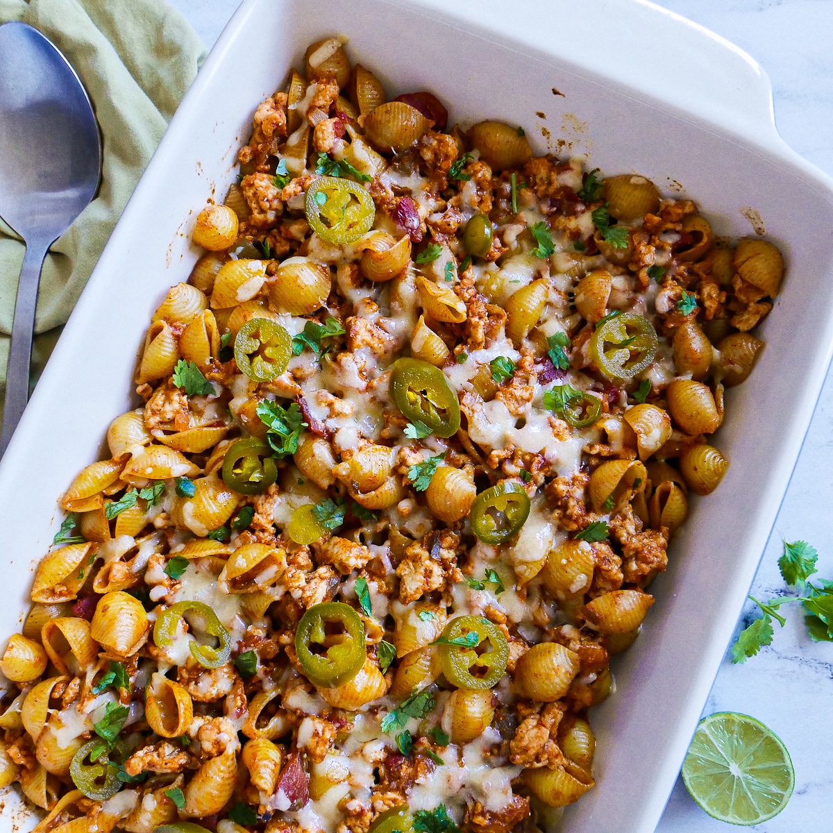garnished-pasta-bake.jpg Mexican pasta bake garnished with sliced jalapenos and cilantro.