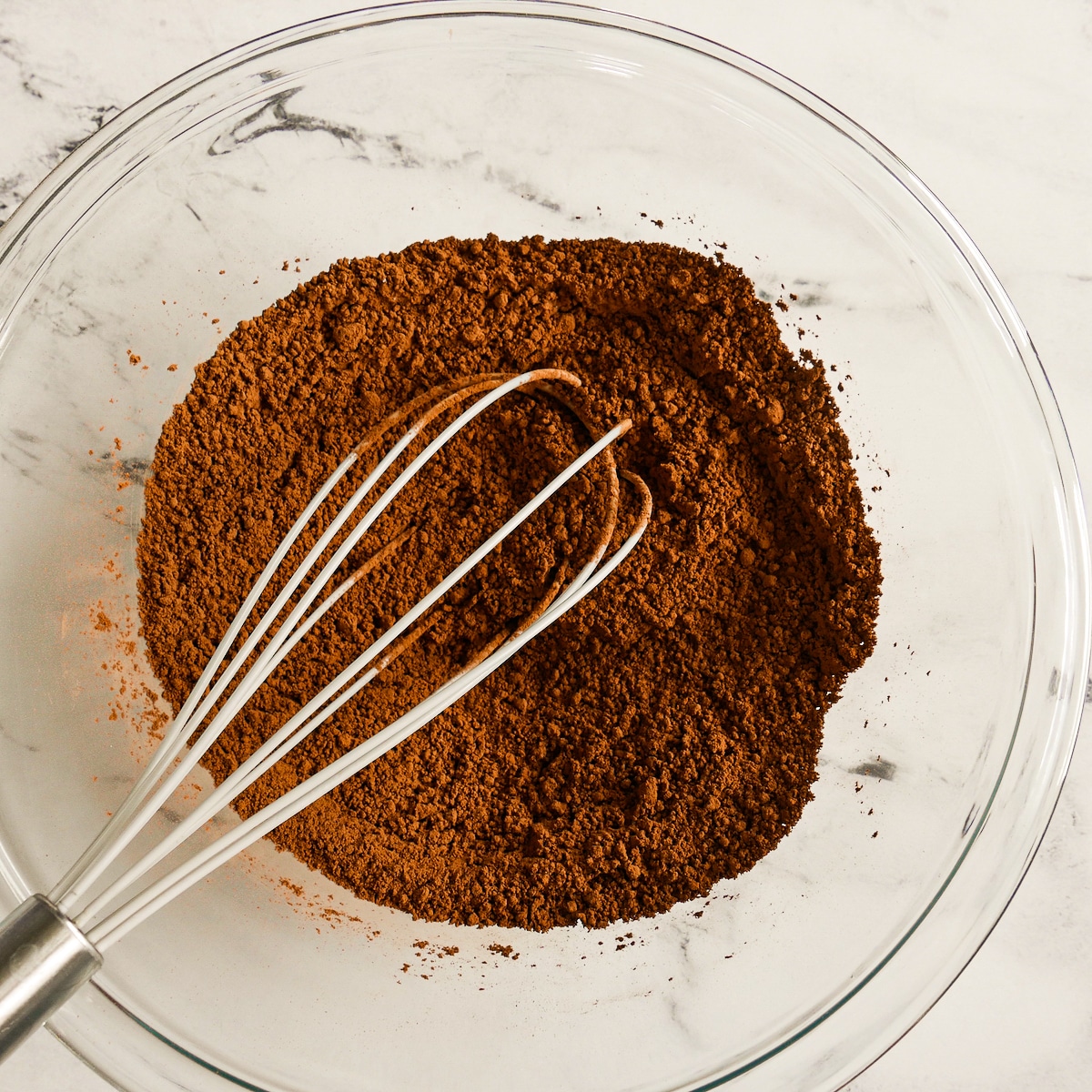 Dry ingredients whisked together in a large mixing bowl.