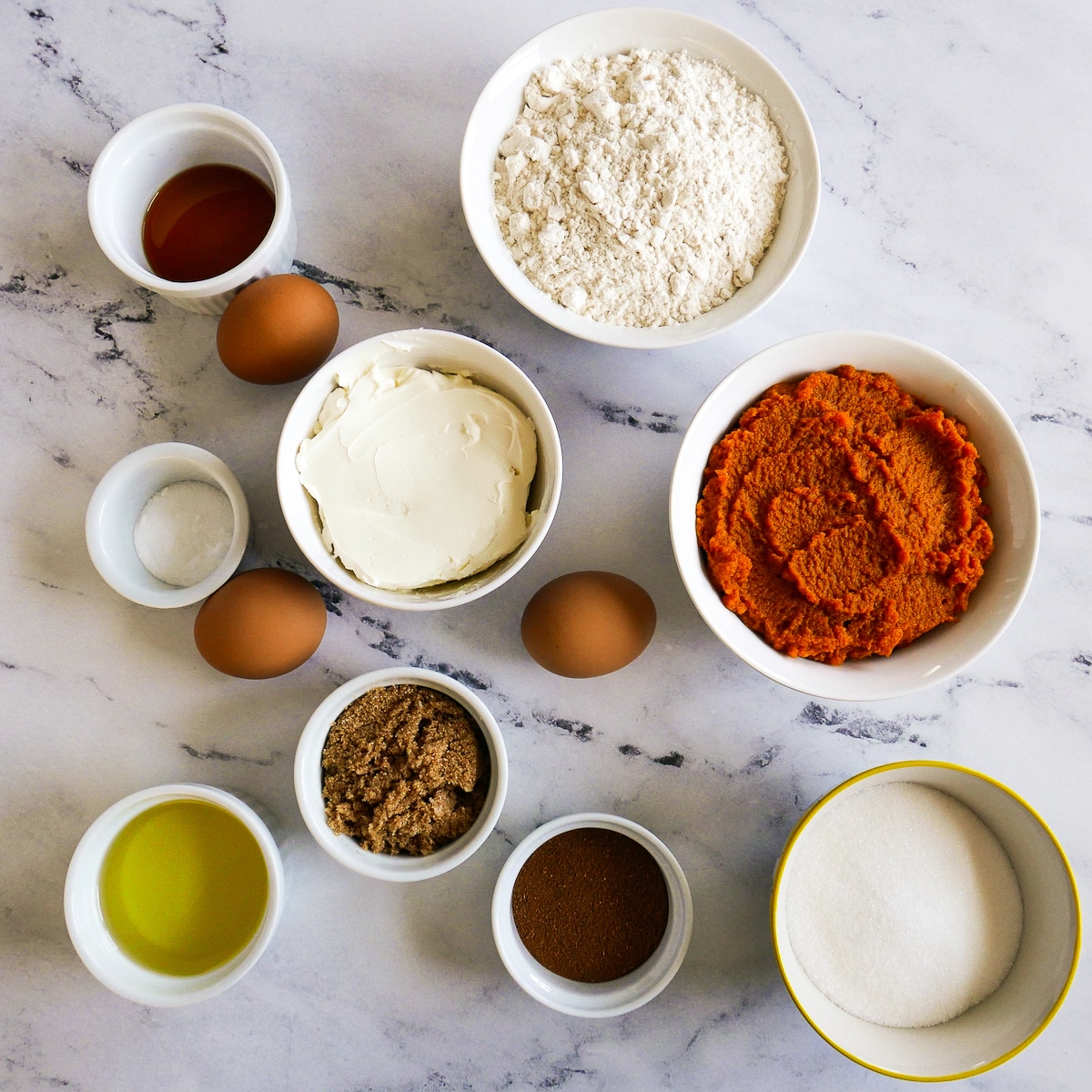 muffin-ingredients.jpg Muffin ingredients arranged on a table.
