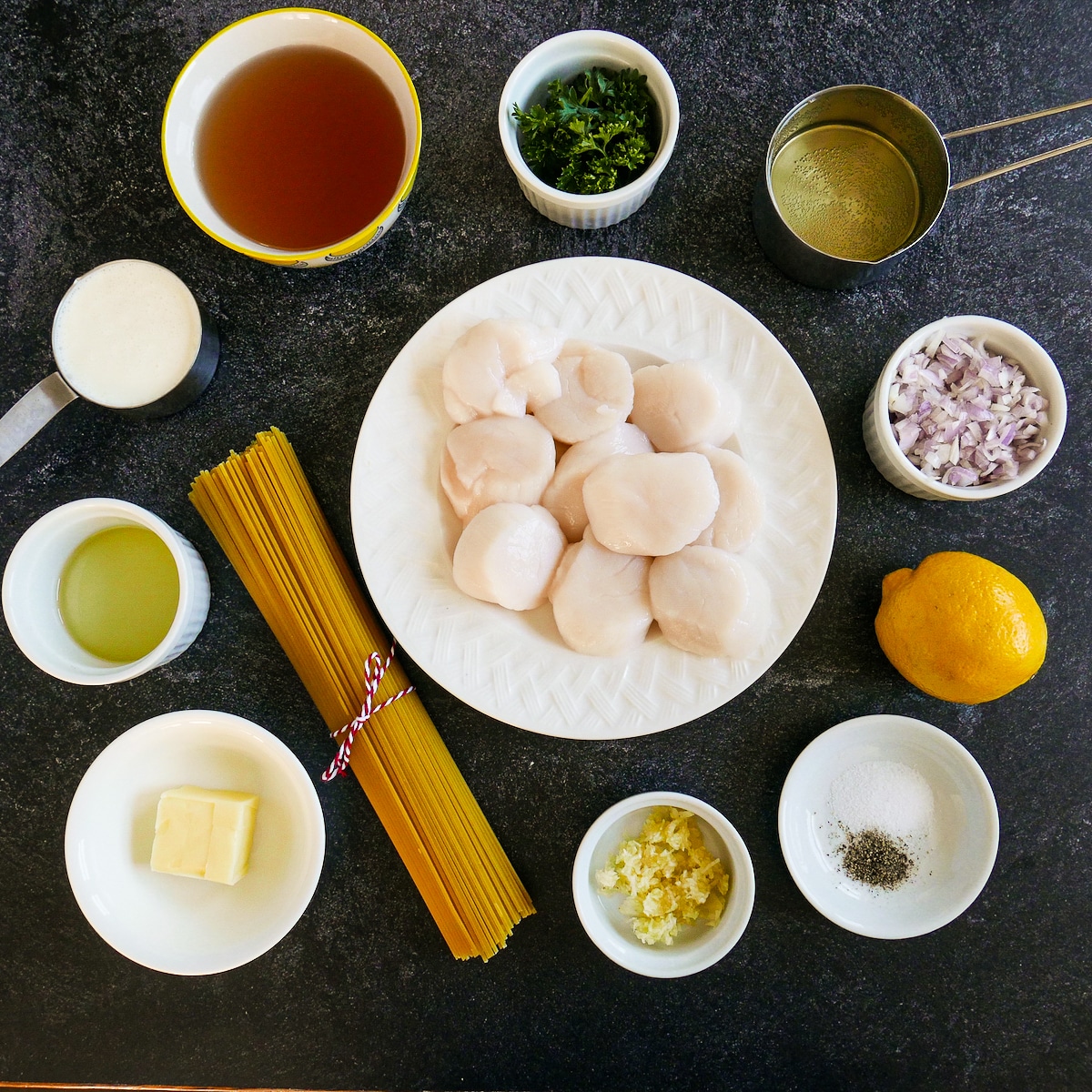 Linguine ingredients arranged on a table.