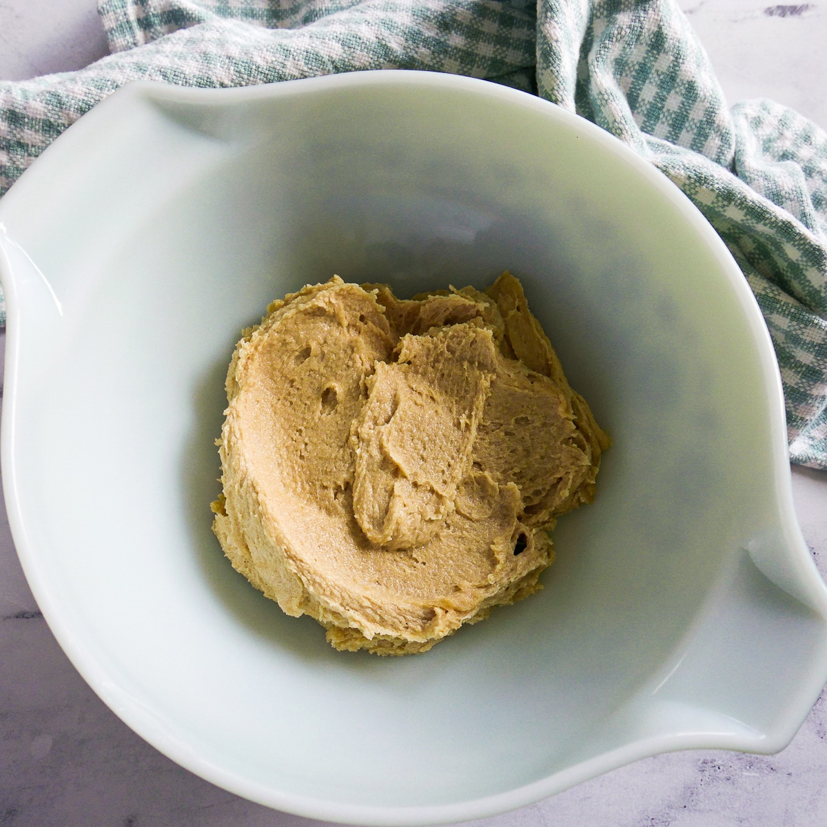 creamed butter and sugars in a mixing bowl.