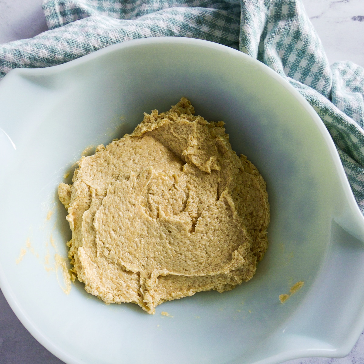 cookie dough mixture after adding eggs and vanilla extract.