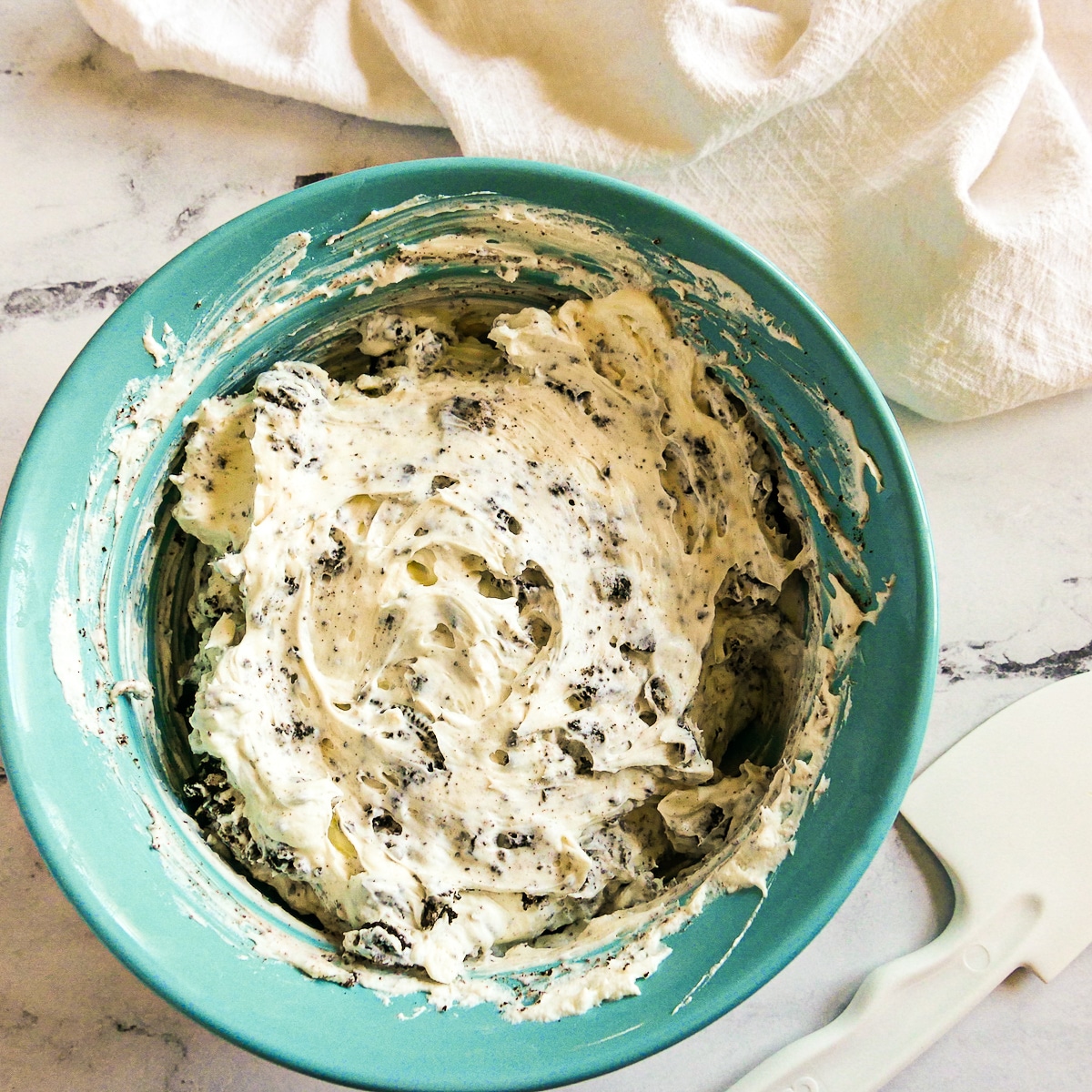 whipped cream and crushed oreos folded into cream cheese mixture.