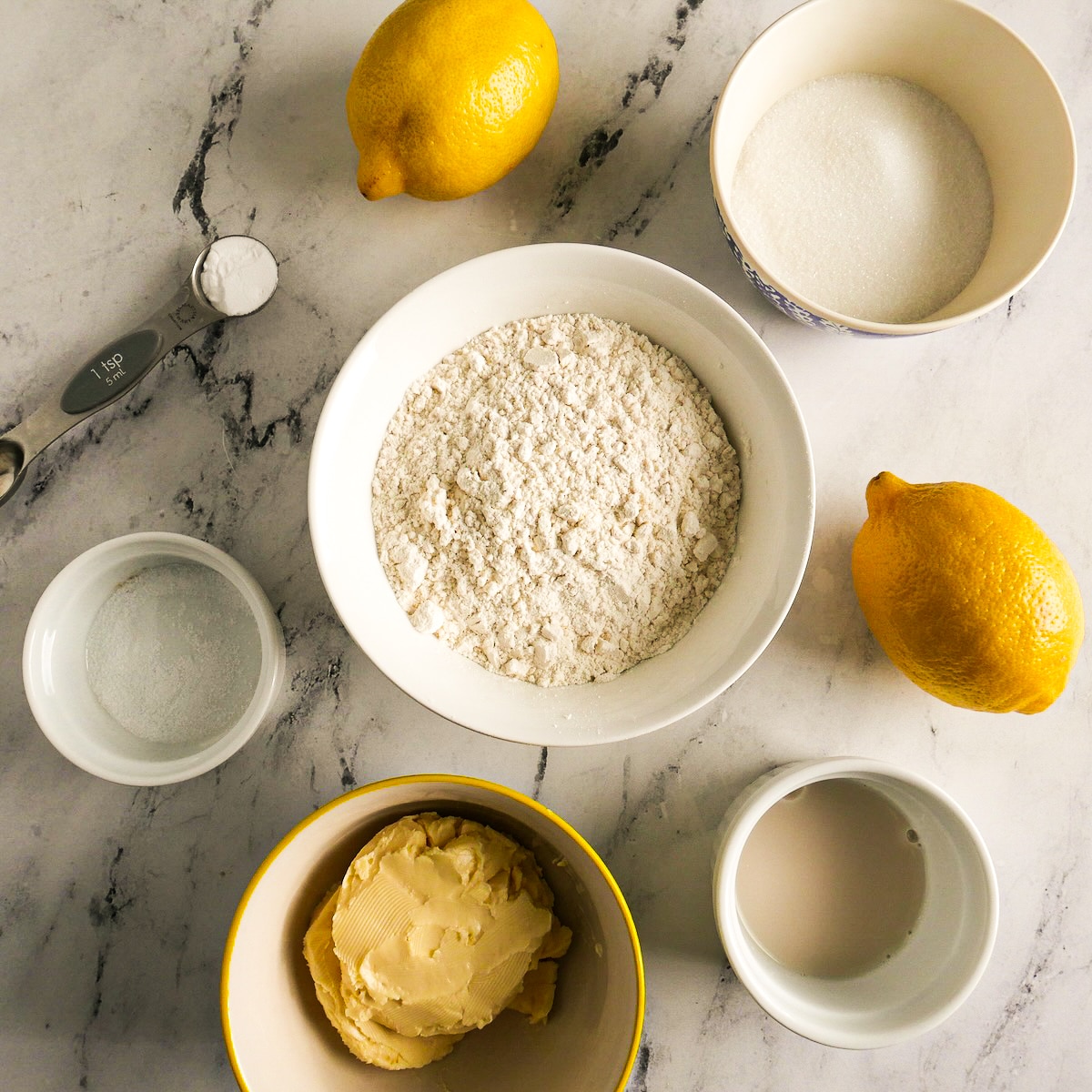 Cookie ingredients arranged on a table.