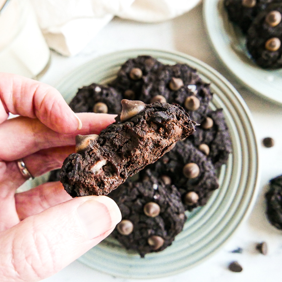 Half eaten cookie with chocolate chips. 