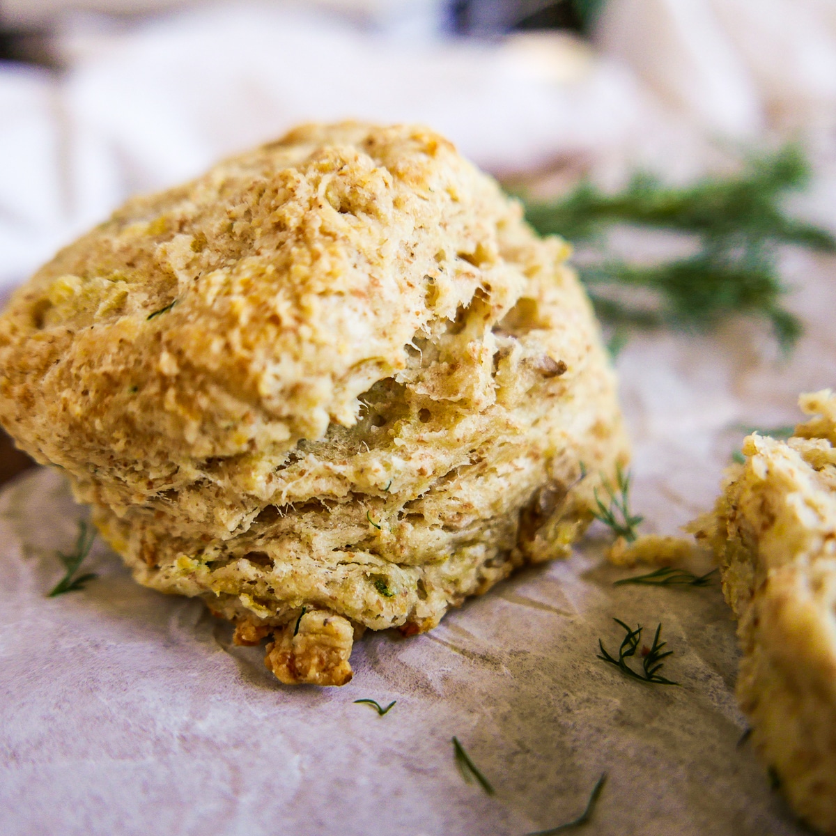 Buttery biscuits on a baking sheet.