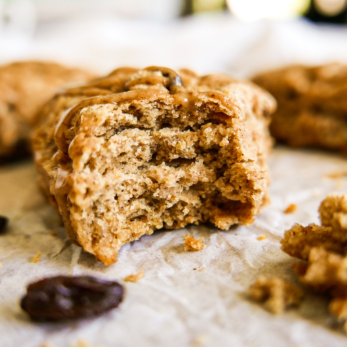 inside of a tender and flaky scone with raisins. 