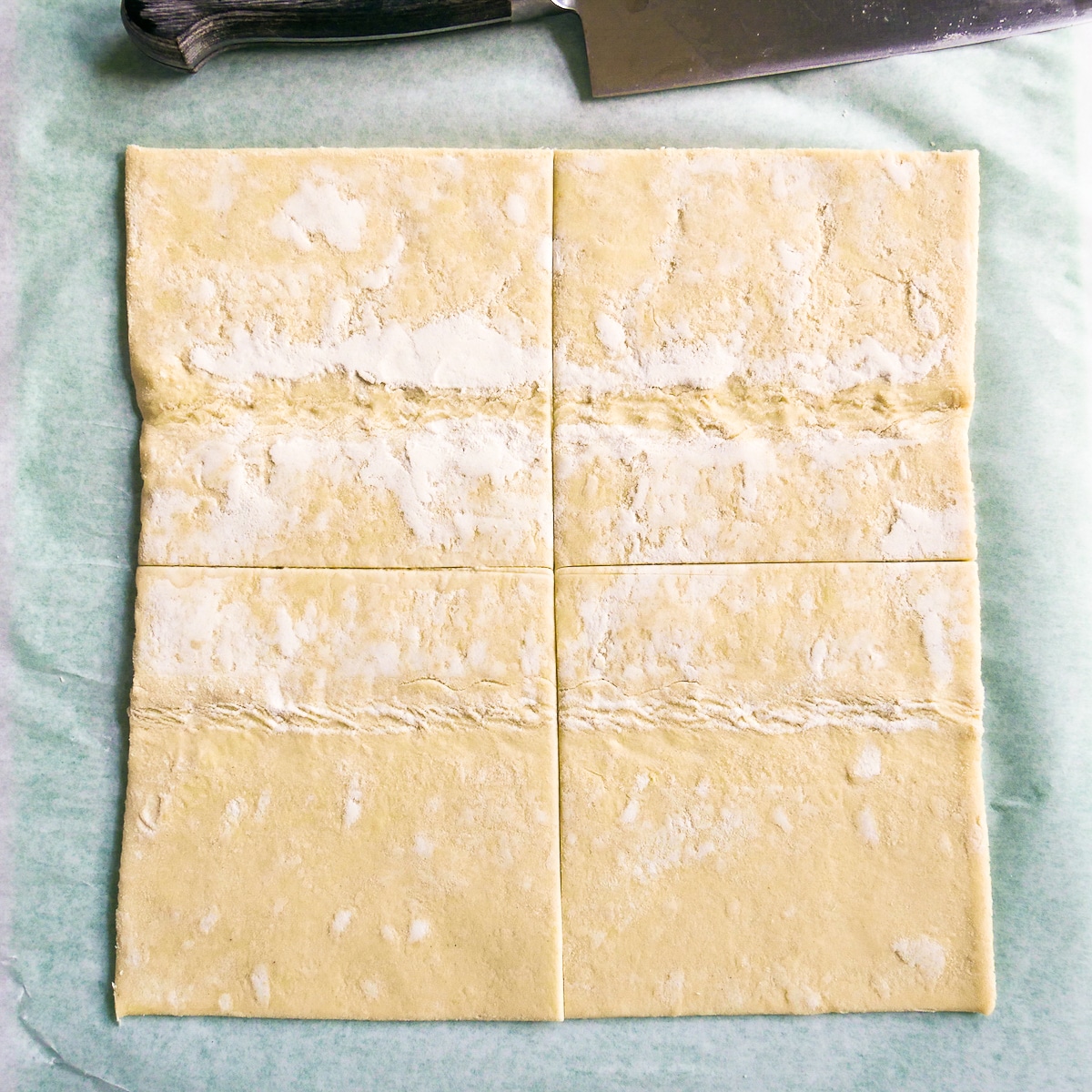 Sheet of puff pastry cut into 4 equal squares.