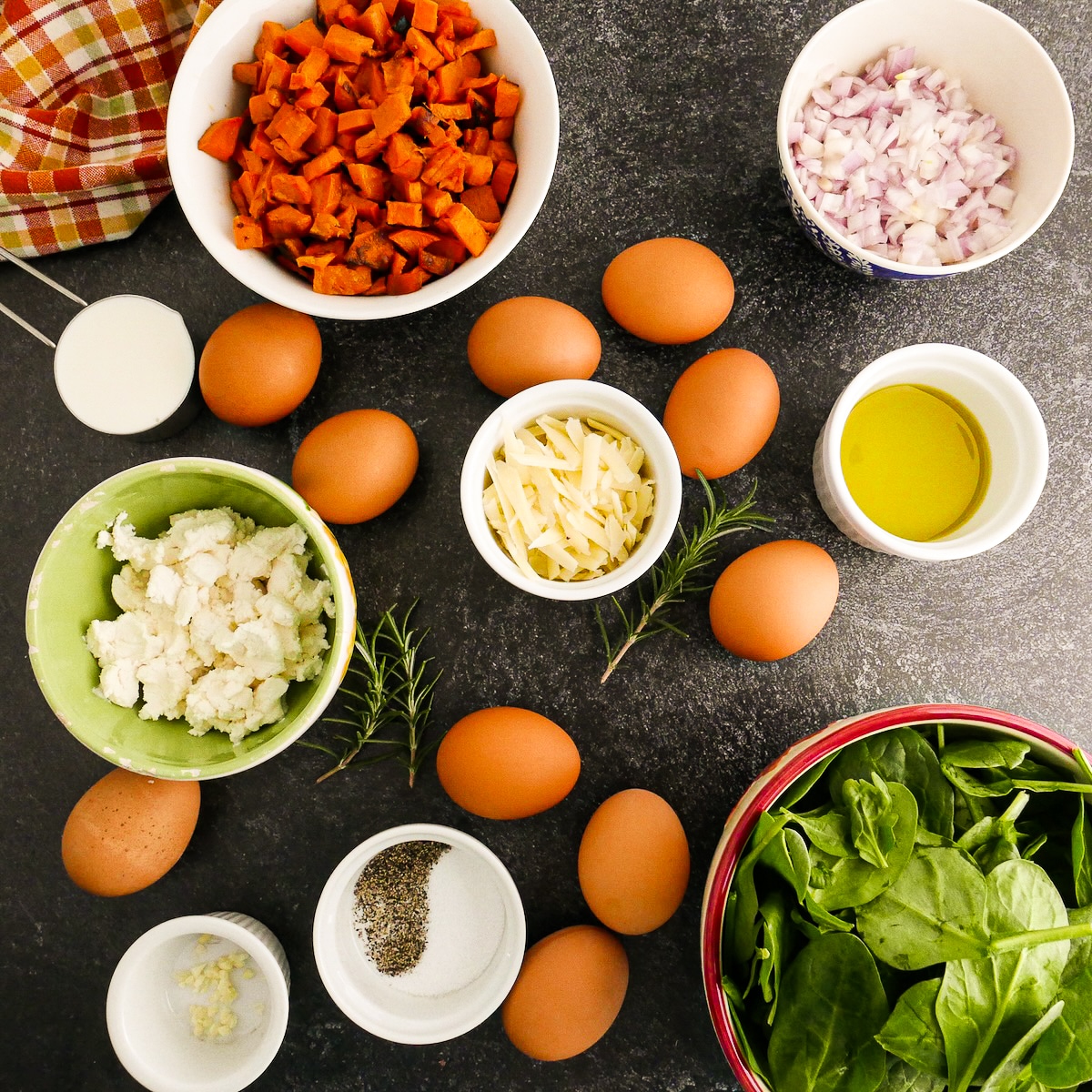 Frittata ingredients arranged on a table.