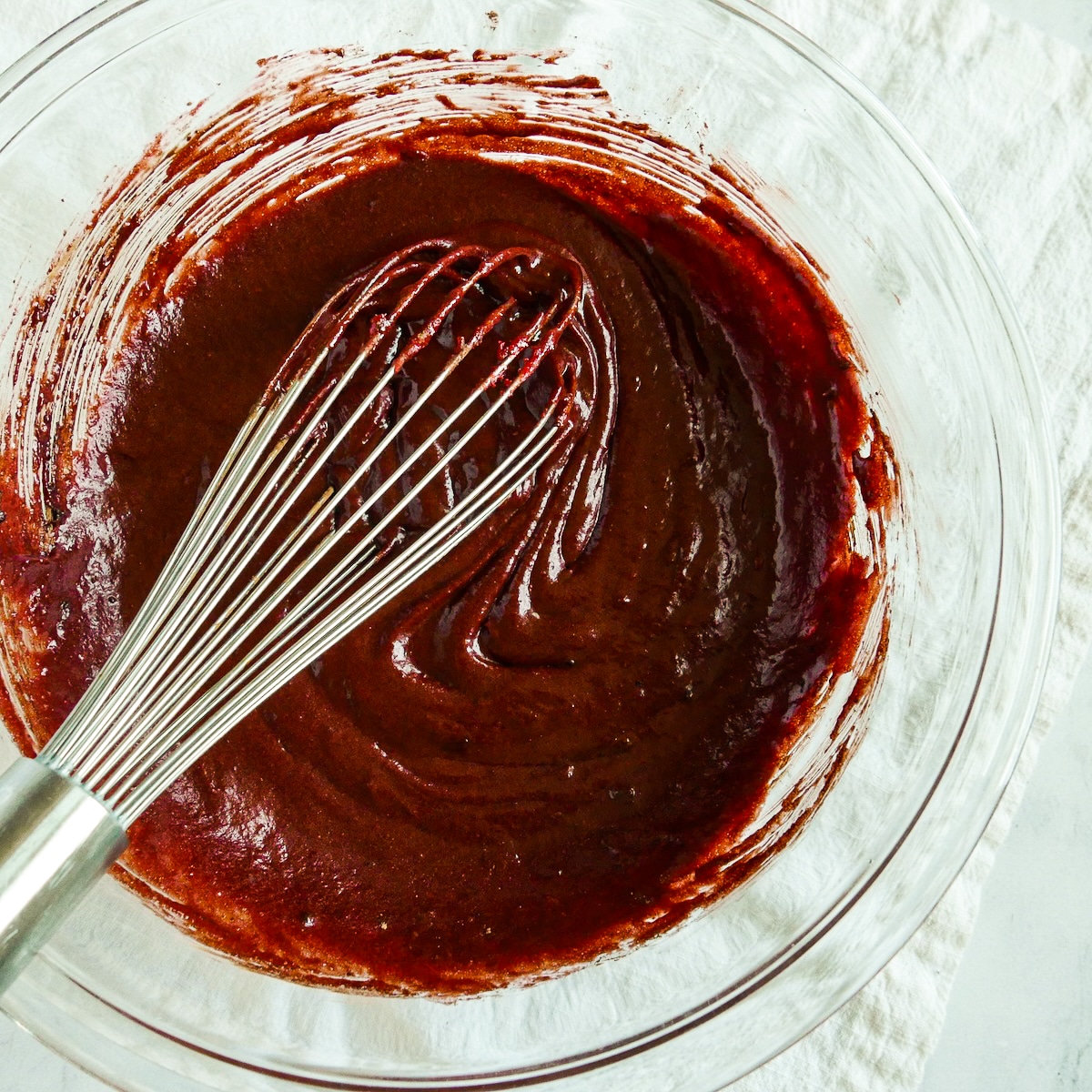 Flour mixed into brownie batter.