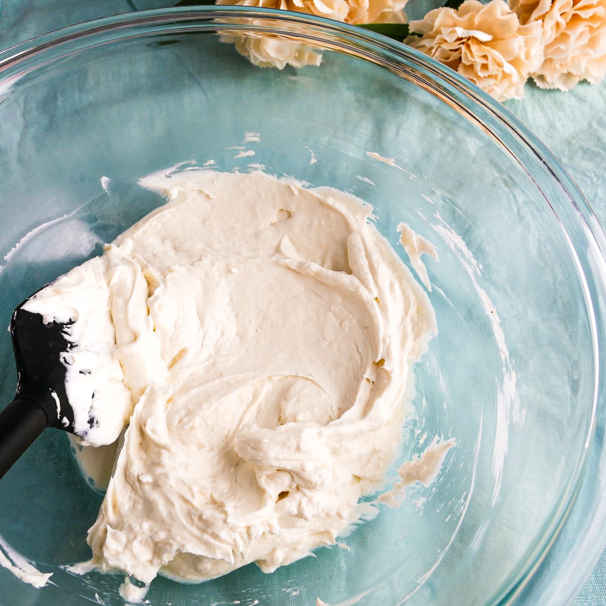 coconut-cream-mixture.jpg Coconut cream, coconut oil, and cream cheese combined in a mixing bowl.