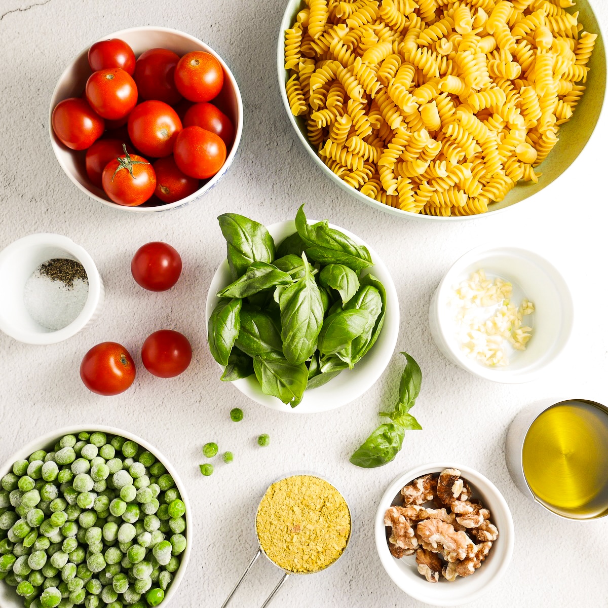 Pasta ingredients arranged on a table.