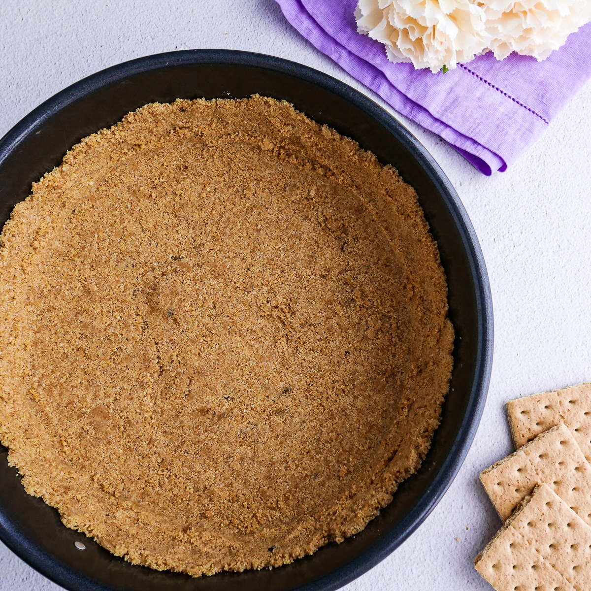 graham cracker crust pressed into a springform pan.