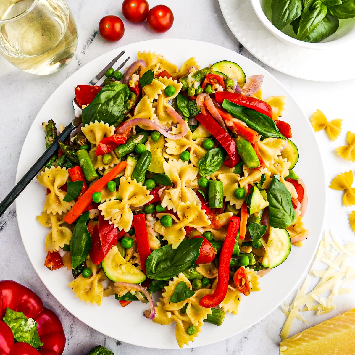 pasta-with-fork.jpg Light and healthy pasta primavera with a fork.