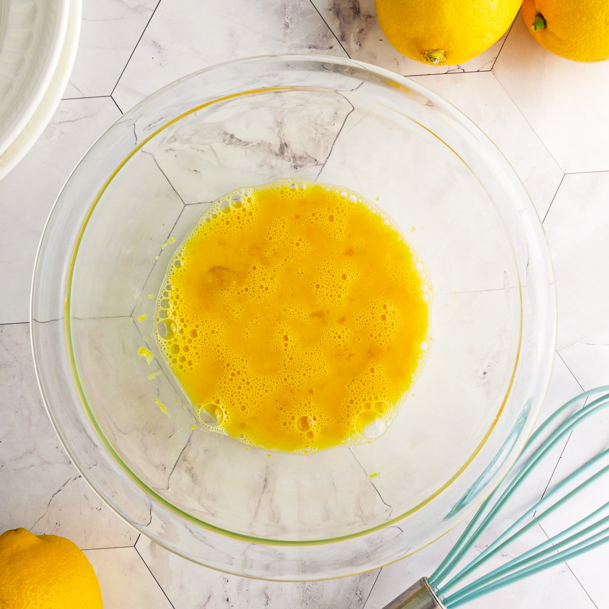 eggs-and-lemon-zest.jpg Eggs and lemon zest whisked together.