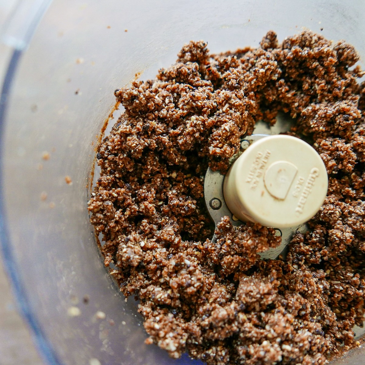 Energy ball mixture combined in a food processor. 