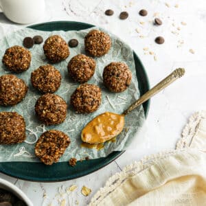 Protein energy bites arranged on a plate.