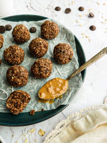 Protein energy bites arranged on a plate.