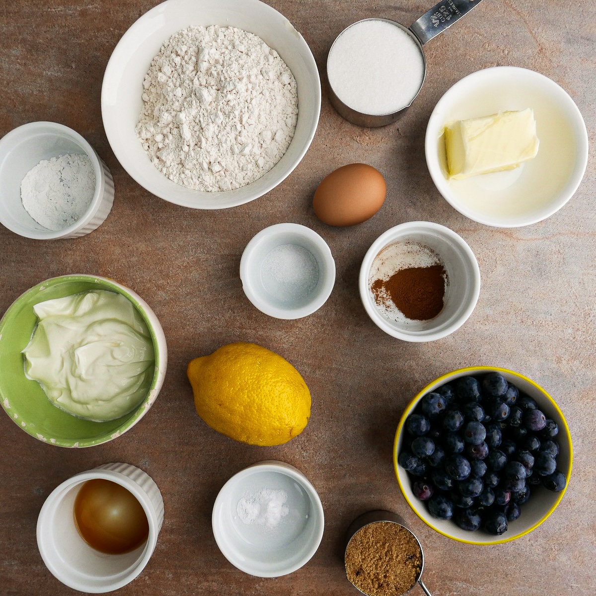 muffin-ingredients.jpg Muffin ingredients arranged on a table.